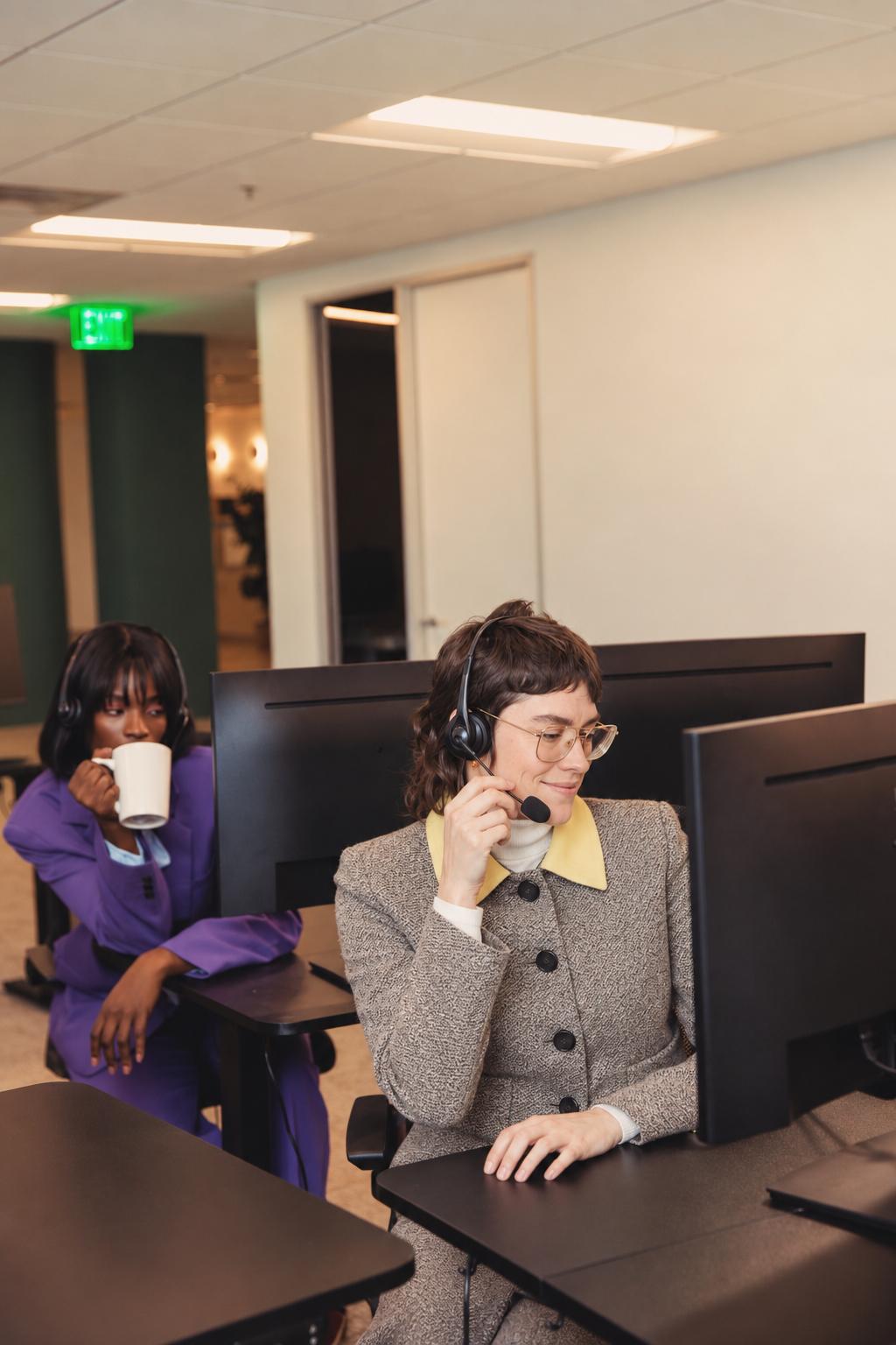 Two Signal House agents working calls at their stations